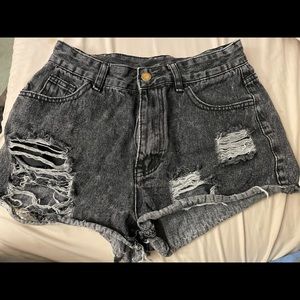 Super cute high waisted ripped jean shorts. Message me for more details